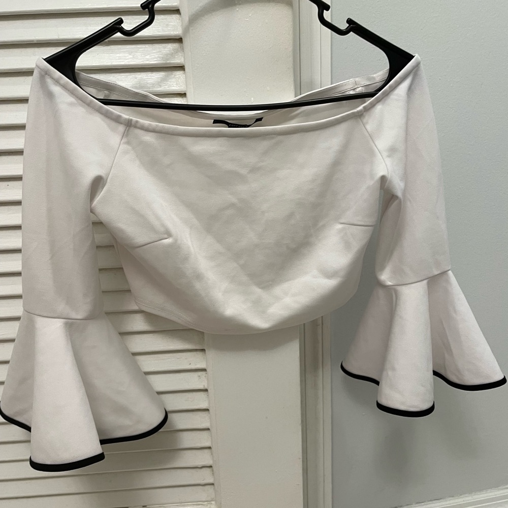 Super cute white top with curly sleeves